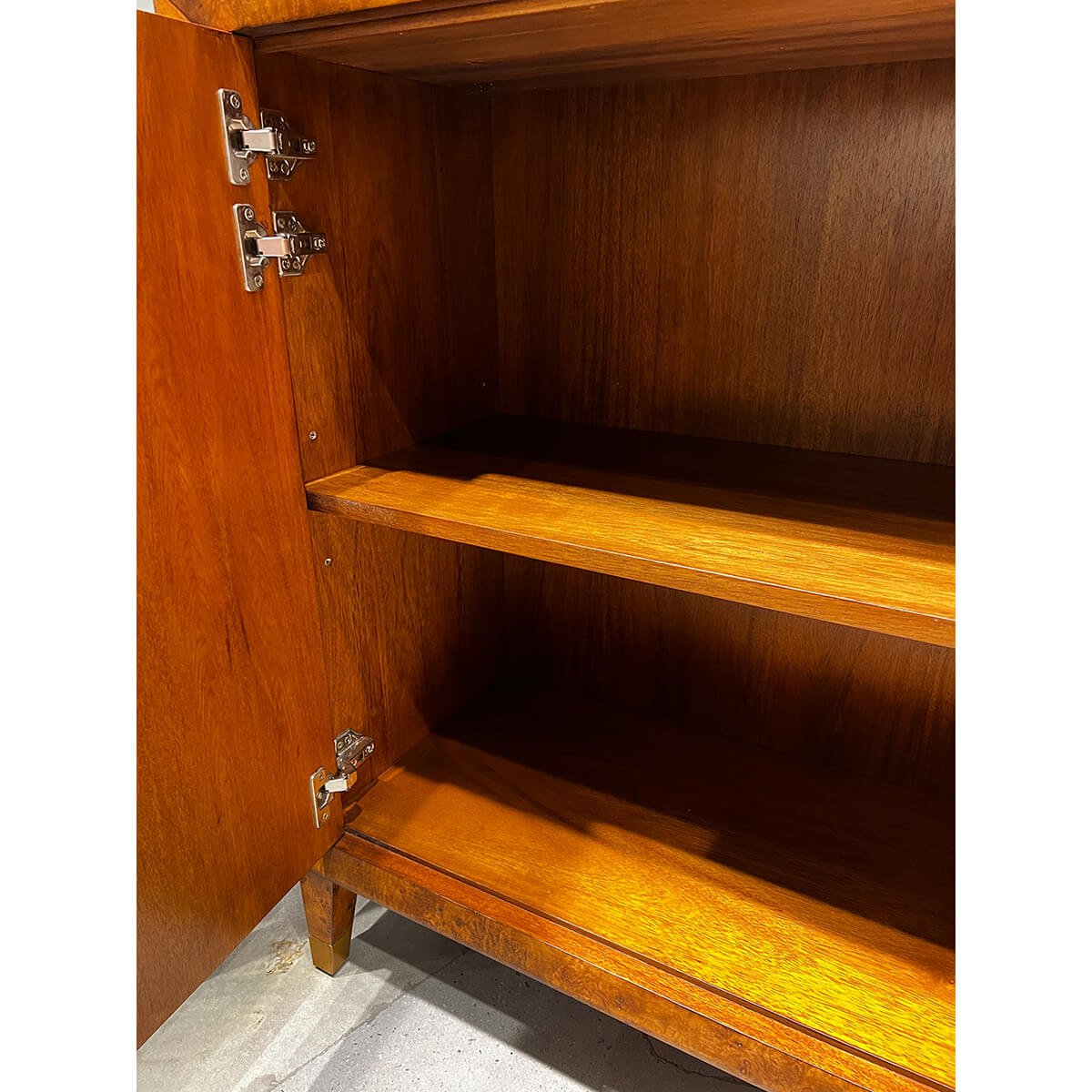 Inside shelf detail of Small Mid-Century Burl Cabinet.