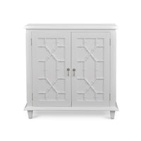 Small mid-century white cabinet, front view, closed doors.