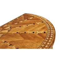 Close-up of table surface with ornate inlay details.