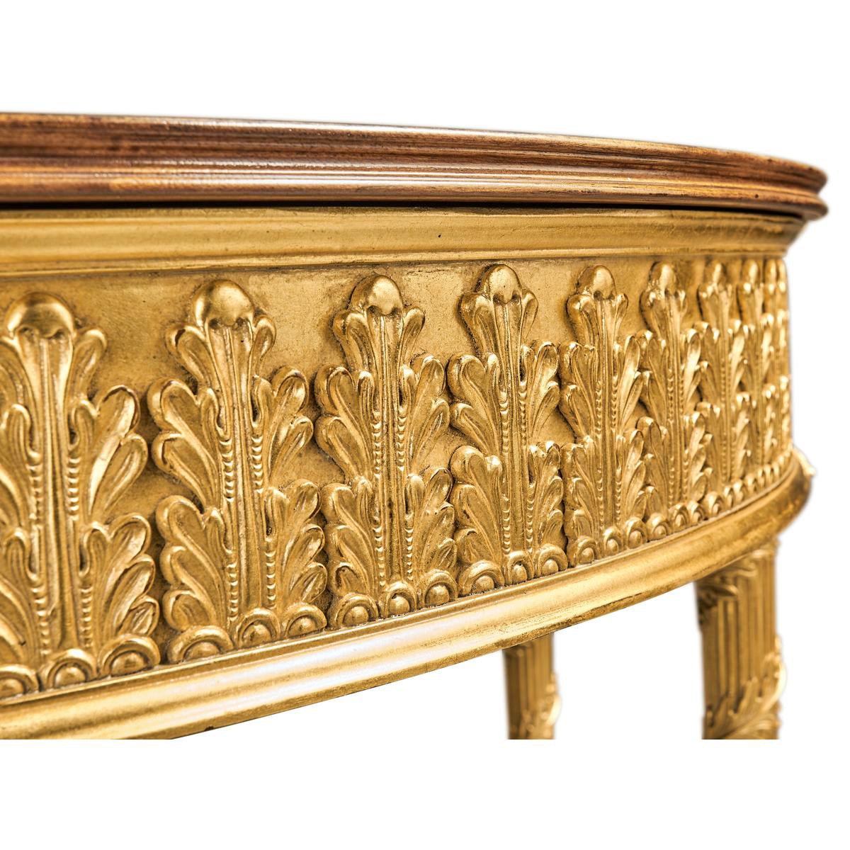 Close-up of decorative giltwood on console table edge.