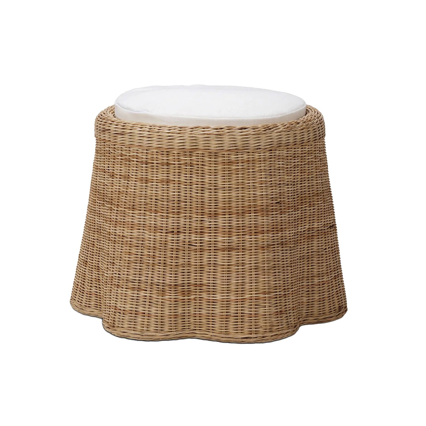 Small round rattan ottoman with white cushion top.