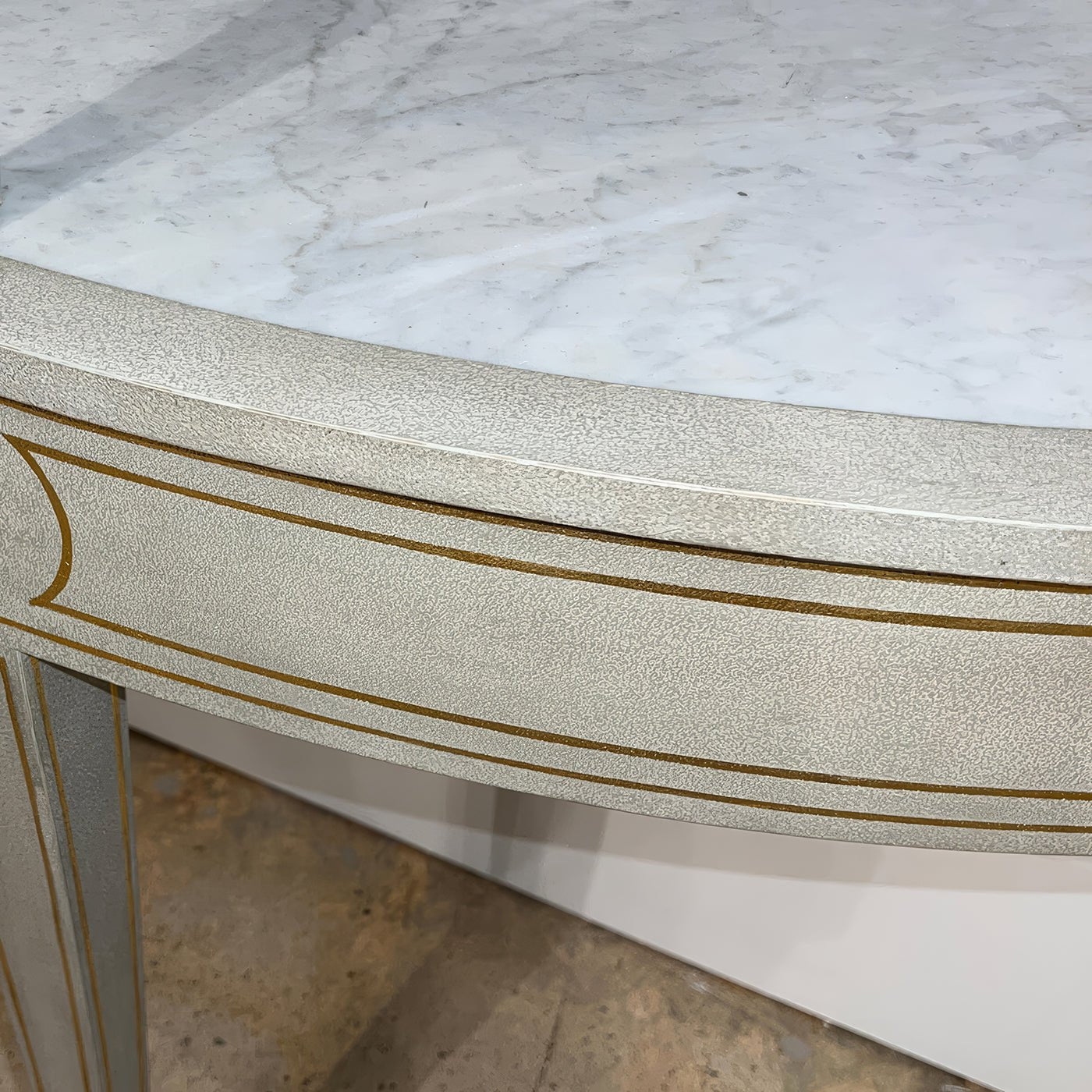 Detailed view of console's marble-like top.