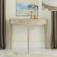 Decorated console table in stylish living room setting.