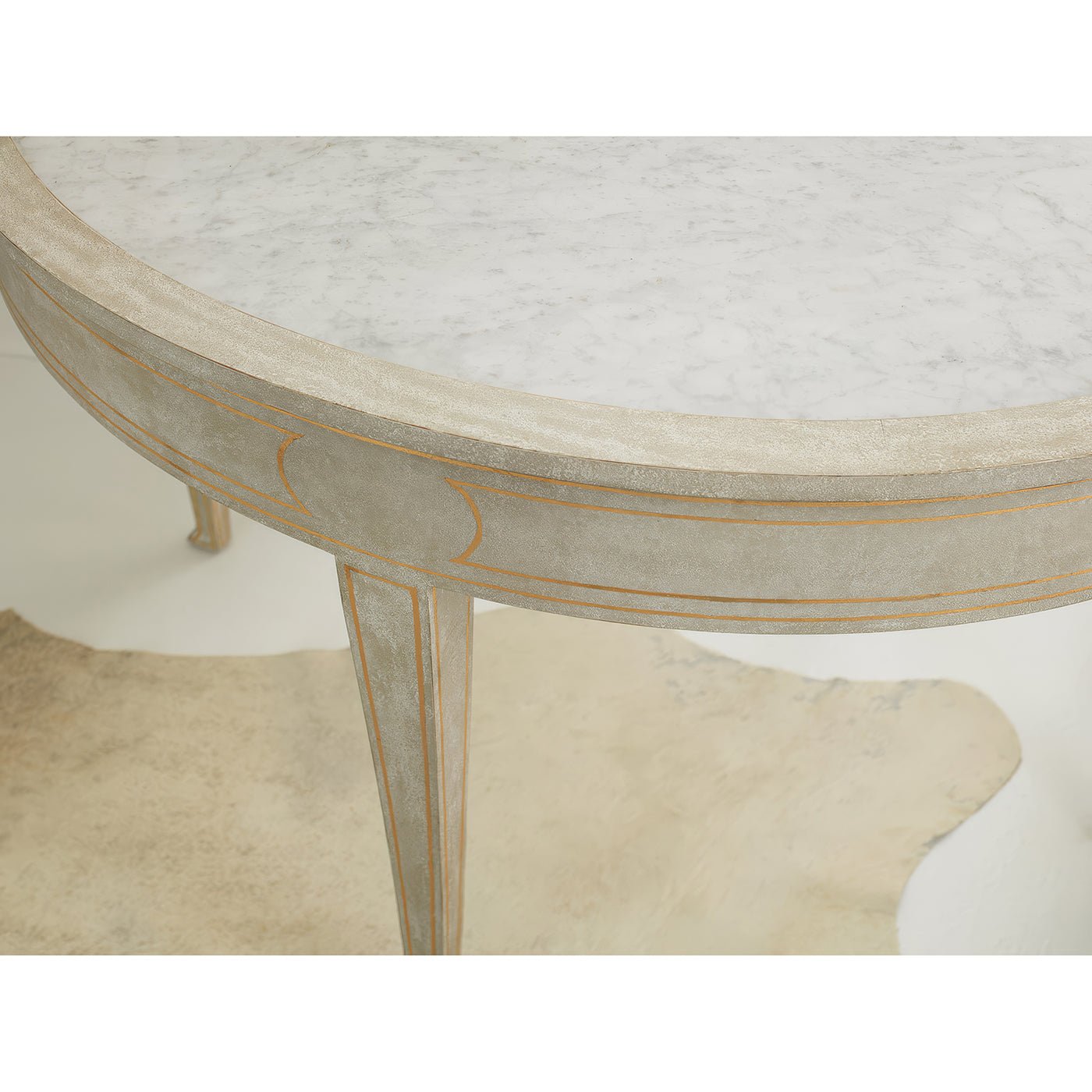 Close-up of table surface with gold accents.