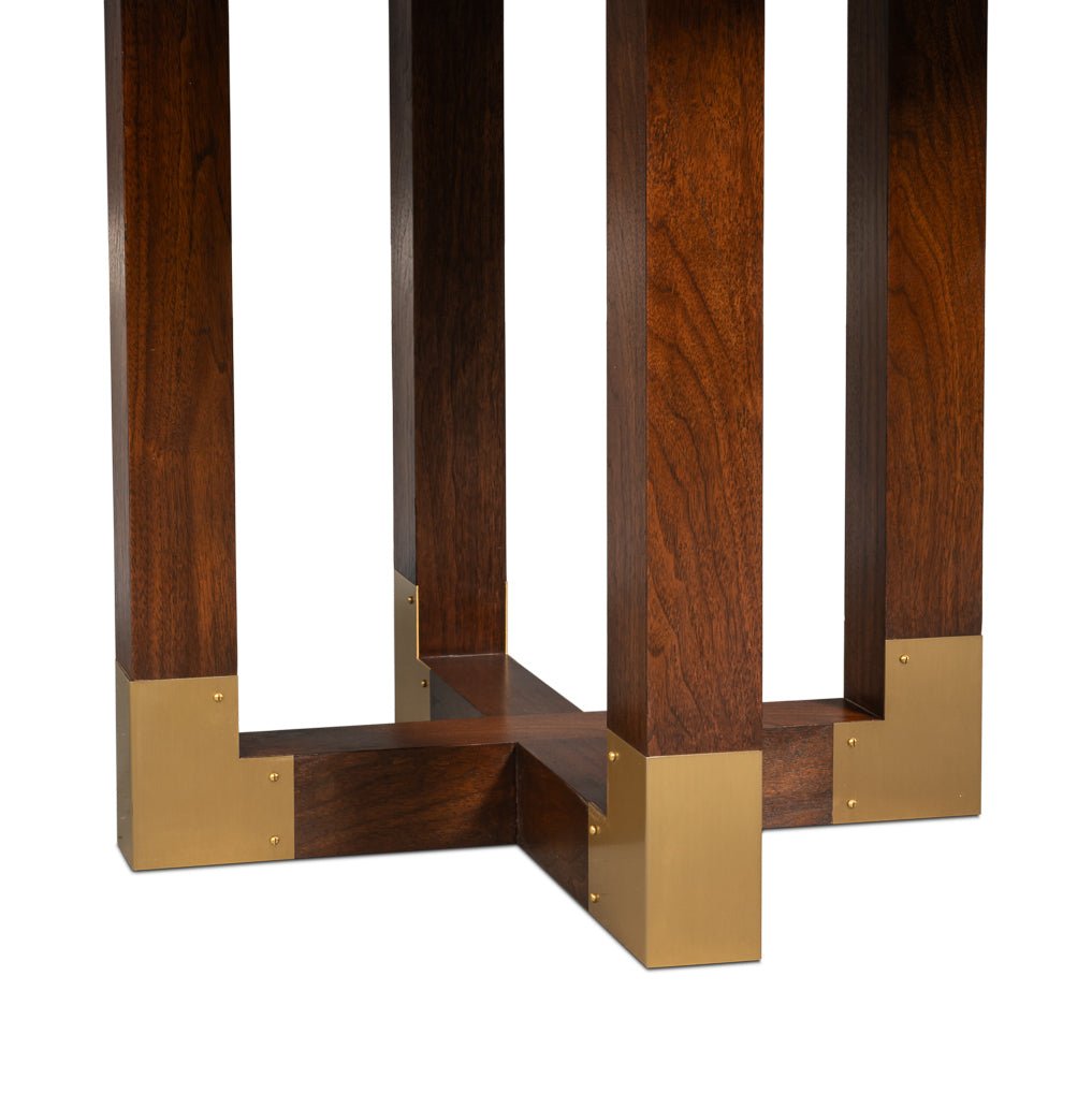 Table base with wood and gold accents.