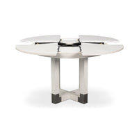 Jupe dining table with open expanding mechanism.