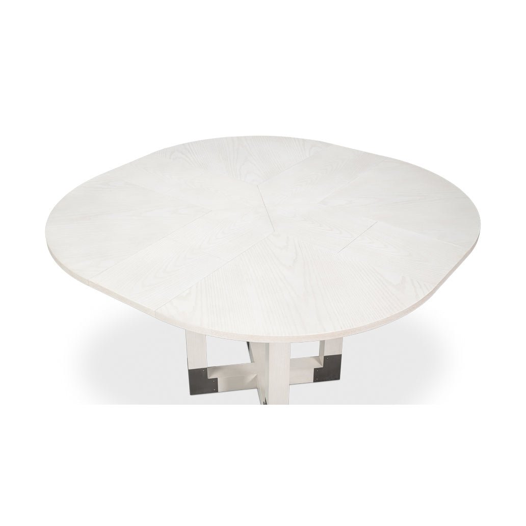 Angled top view, small white Jupe dining table.
