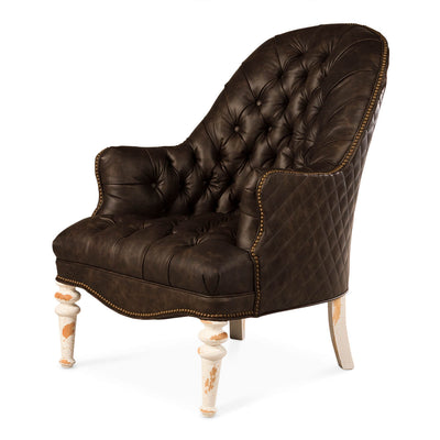 Dark brown tufted leather accent chair, angled front view.