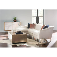 Modern living room with coffee table and sectional sofa.