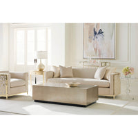 Elegant living room with coffee table and abstract art.