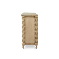 Side profile of spool-turned wood dresser.