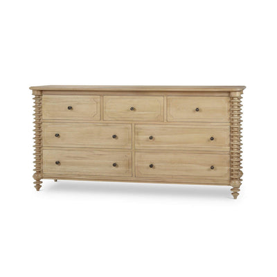 Spool-turned light wood dresser front view.