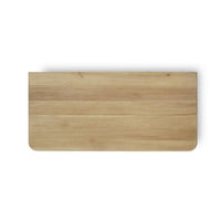 Spool-turned chest top view, smooth wood surface.