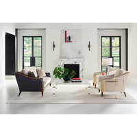 Living room with square acrylic coffee table and decor.
