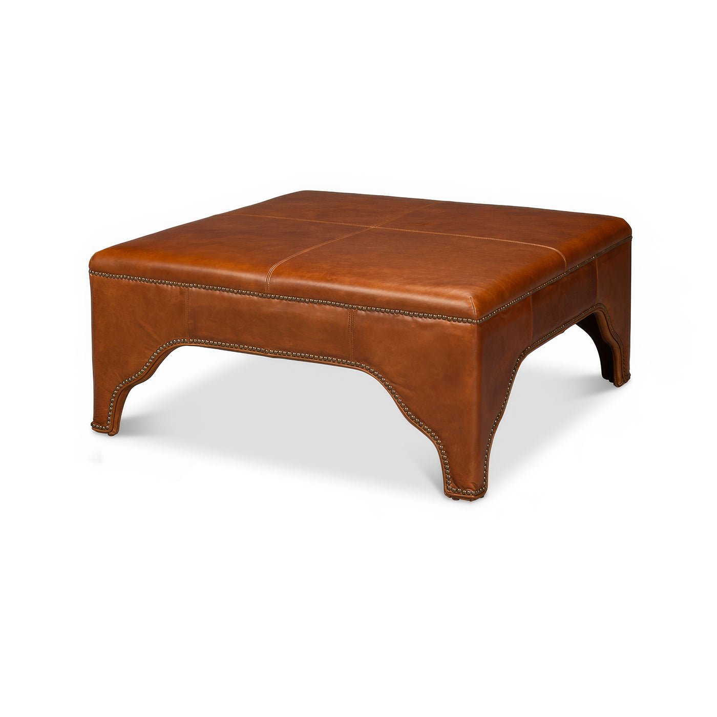 Square brown leather ottoman, angled front view.