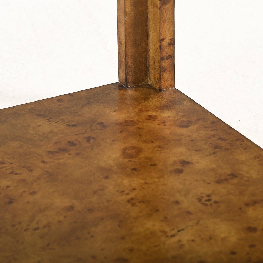 Interior view of burl wood side table arch design.