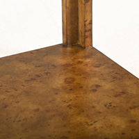 Interior view of burl wood side table arch design.