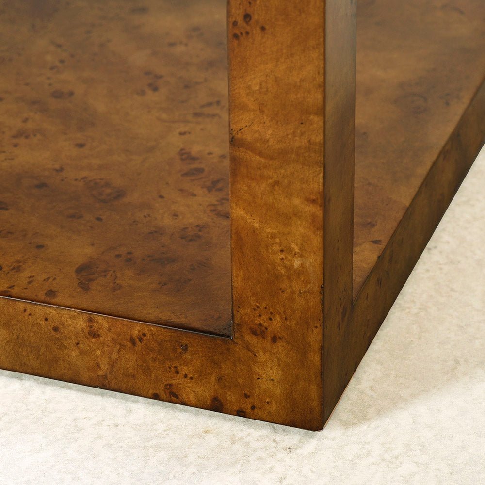 Side view highlighting craftsmanship of burl wood table.
