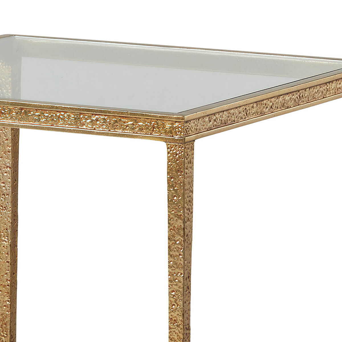 Close-up of gold textured frame and glass top.