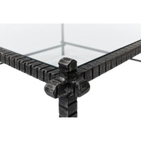 Corner detail, industrial metal joint, glass top focus.