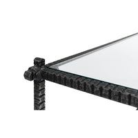 Detailed corner, metal frame, glass top surface.