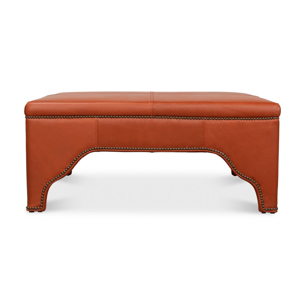 Front view of ottoman, square leather cocktail.