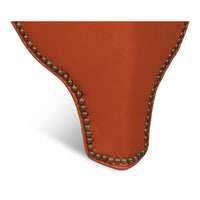 Nailhead trim detail on ottoman's corner.