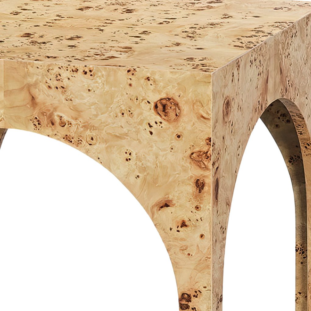 Close-up of arch detail on burl wood side table.