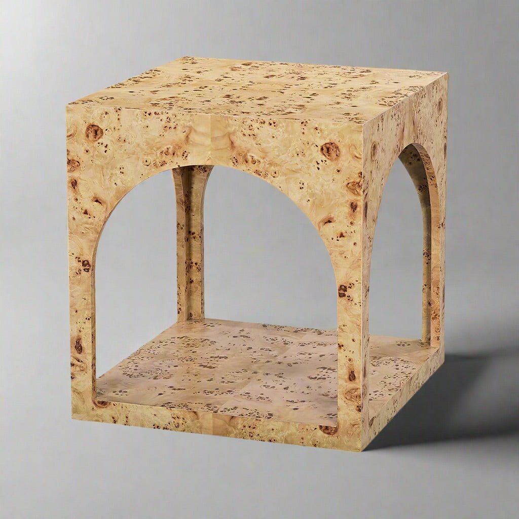 Square light burl wood side table on gray background.