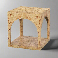 Square light burl wood side table on gray background.