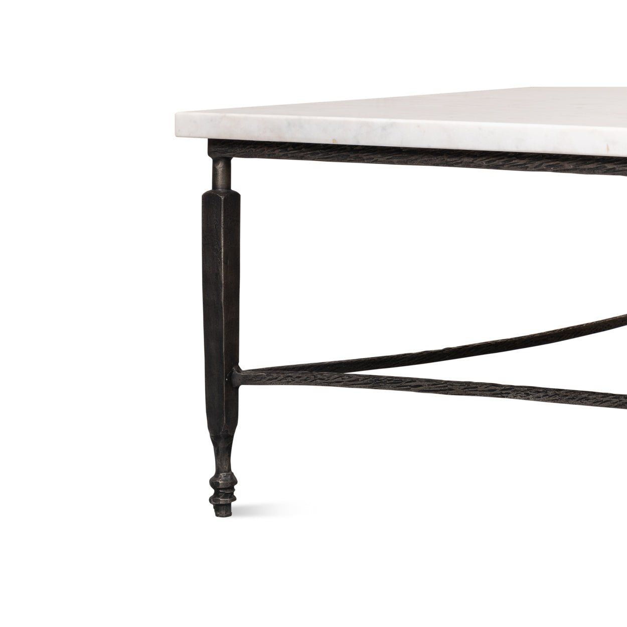 Metal leg detail of marble top coffee table.