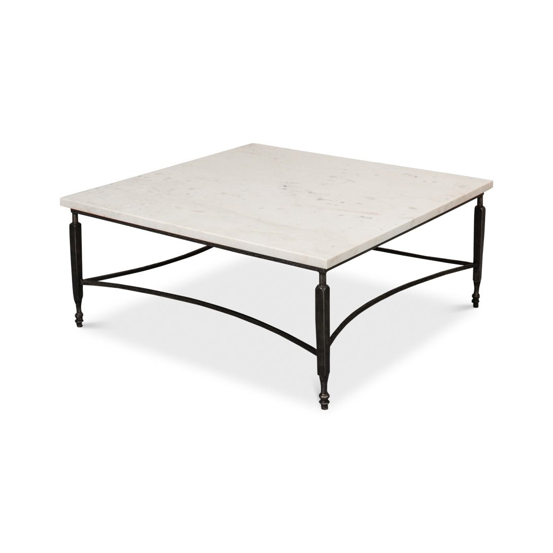 Angled view of minimalist marble coffee table with metal legs.