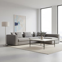 Marble coffee table next to gray sectional in living room.