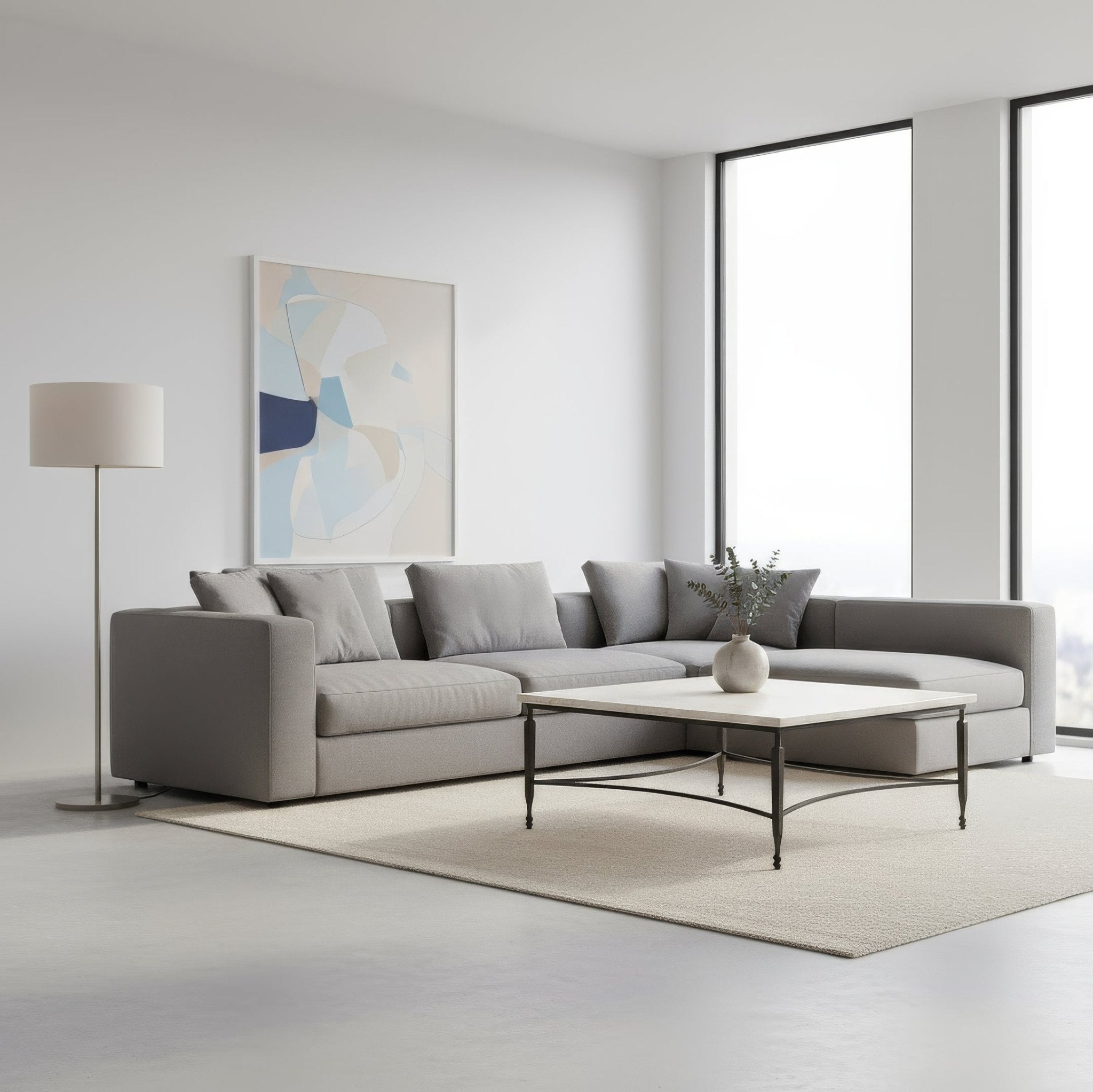 Marble coffee table next to gray sectional in living room.