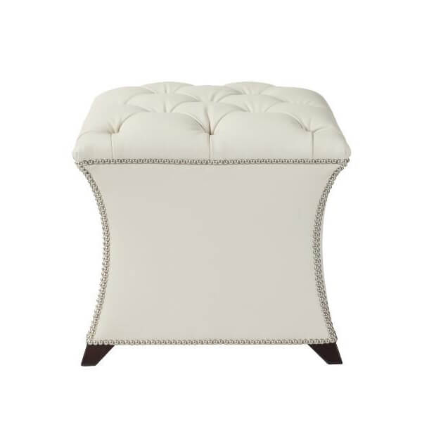 Front view of white square tufted stool with detailing.
