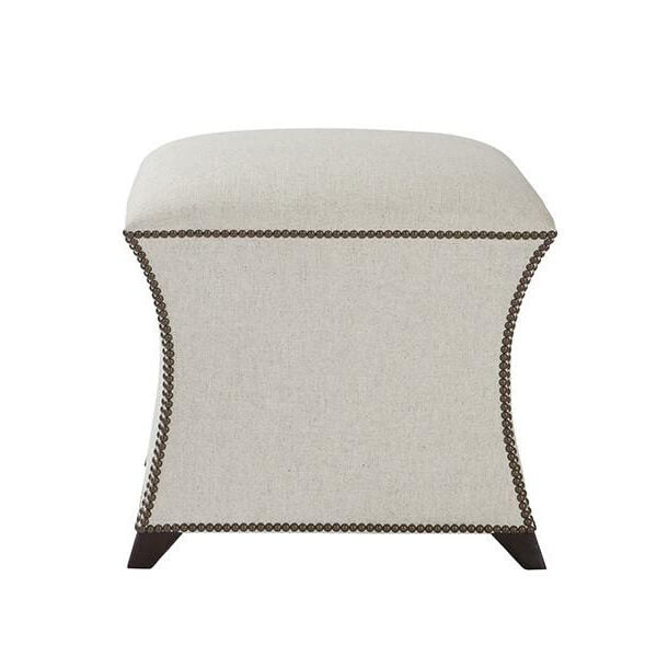 Beige square upholstered stool with decorative trim, front view.
