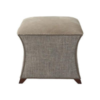 Gray square upholstered stool with decorative trim, front view.