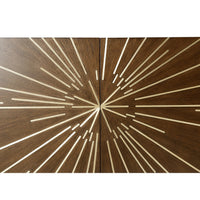 Detailed star pattern on starburst art deco cabinet.
