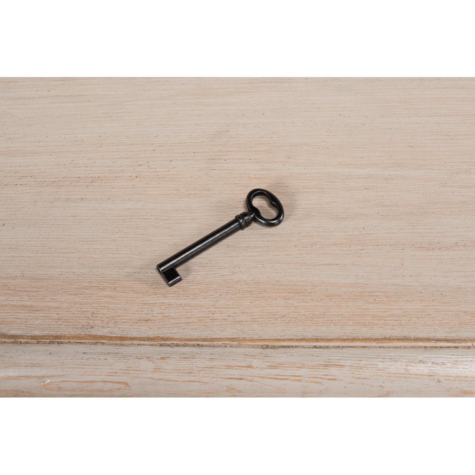 Single black key from the stone painted credenza.