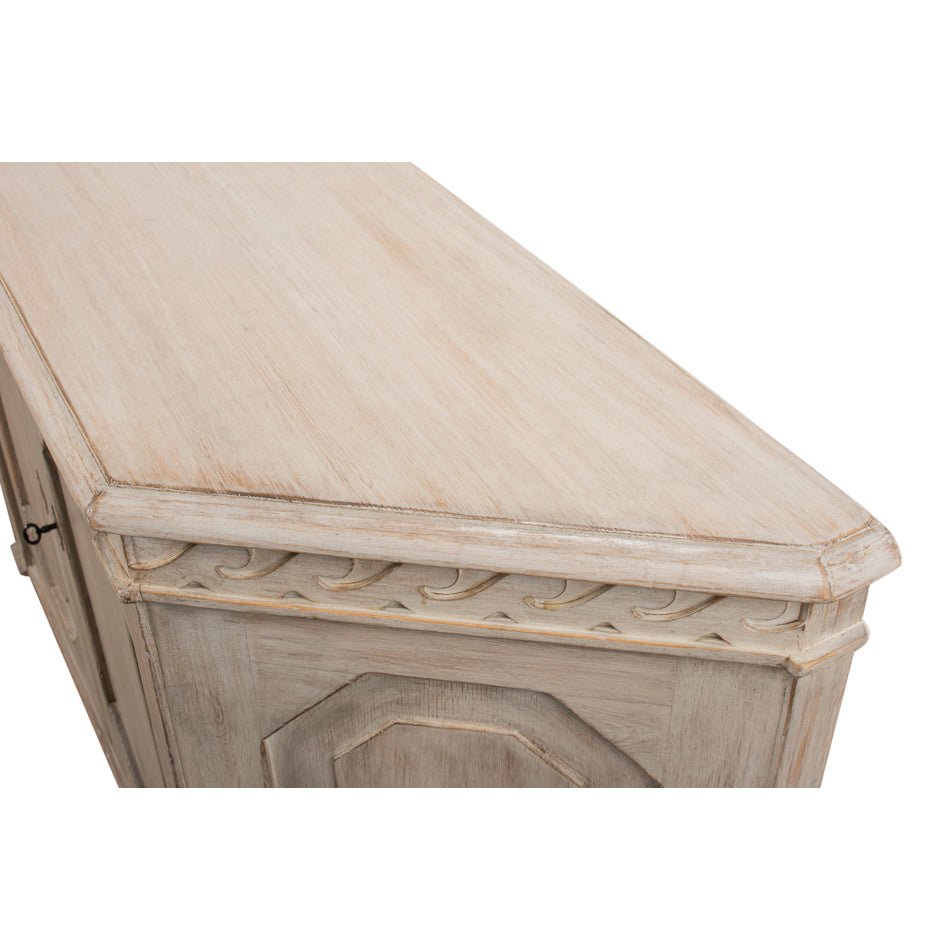Close-up of credenza corner with top detailing.