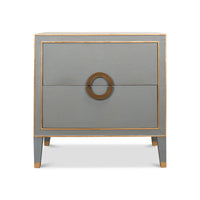 Front view of closed gray nightstand with gold accents.