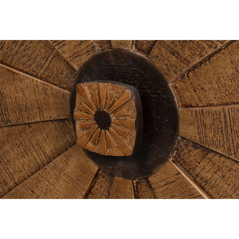 Detailed shot of sunburst door design close-up.