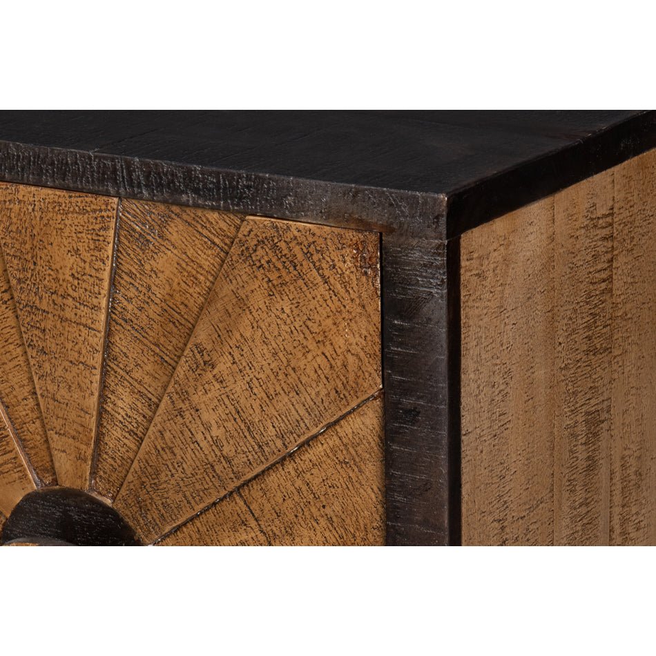 Textured wood close-up on sunburst sideboard.