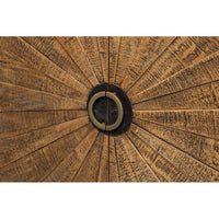 Detailed view of sunburst door design on sideboard.