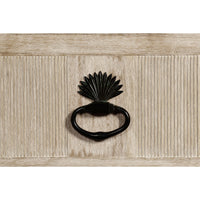 Close-up of dresser handle design on Swedish Bowfront.