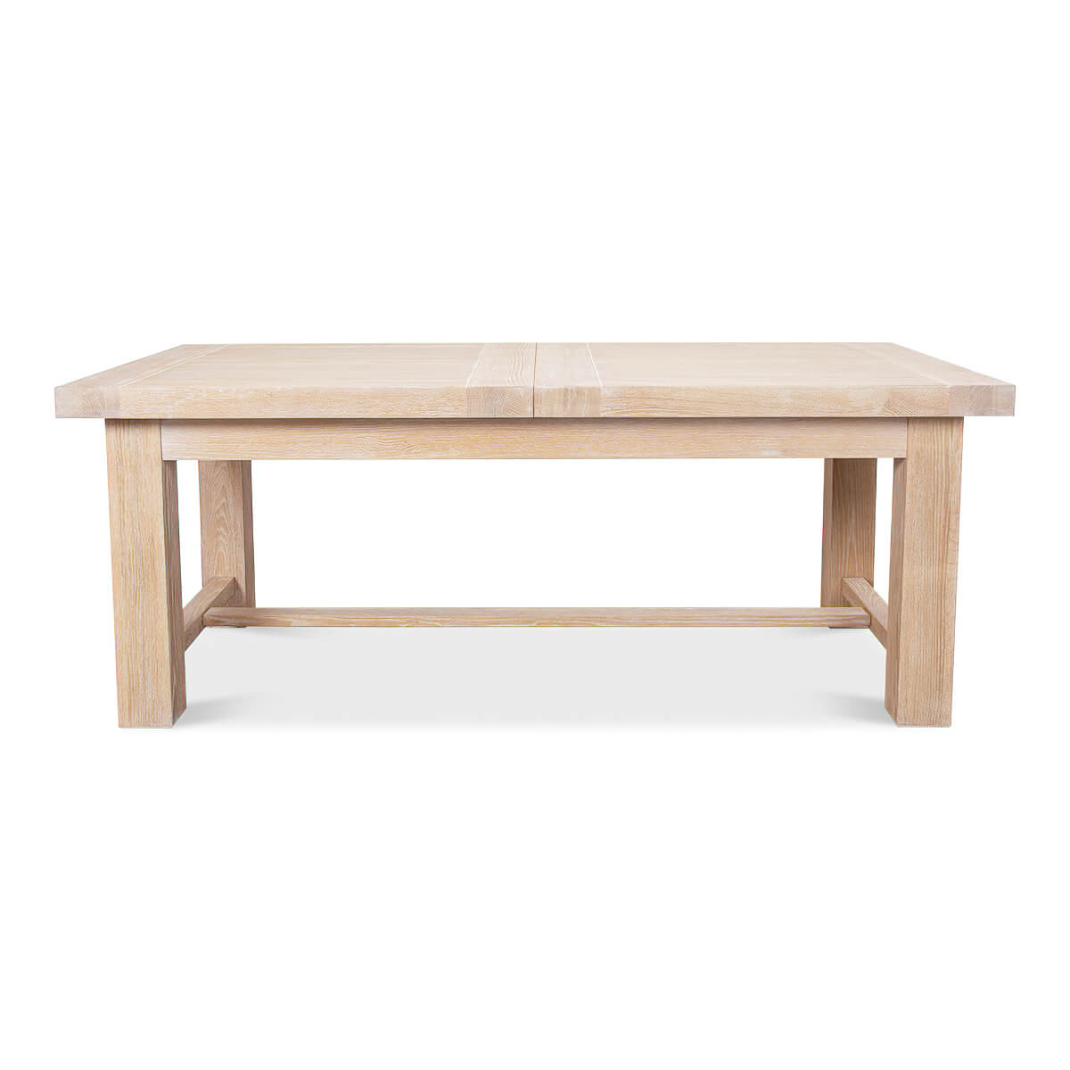 Light oak dining table, front view, extended position.