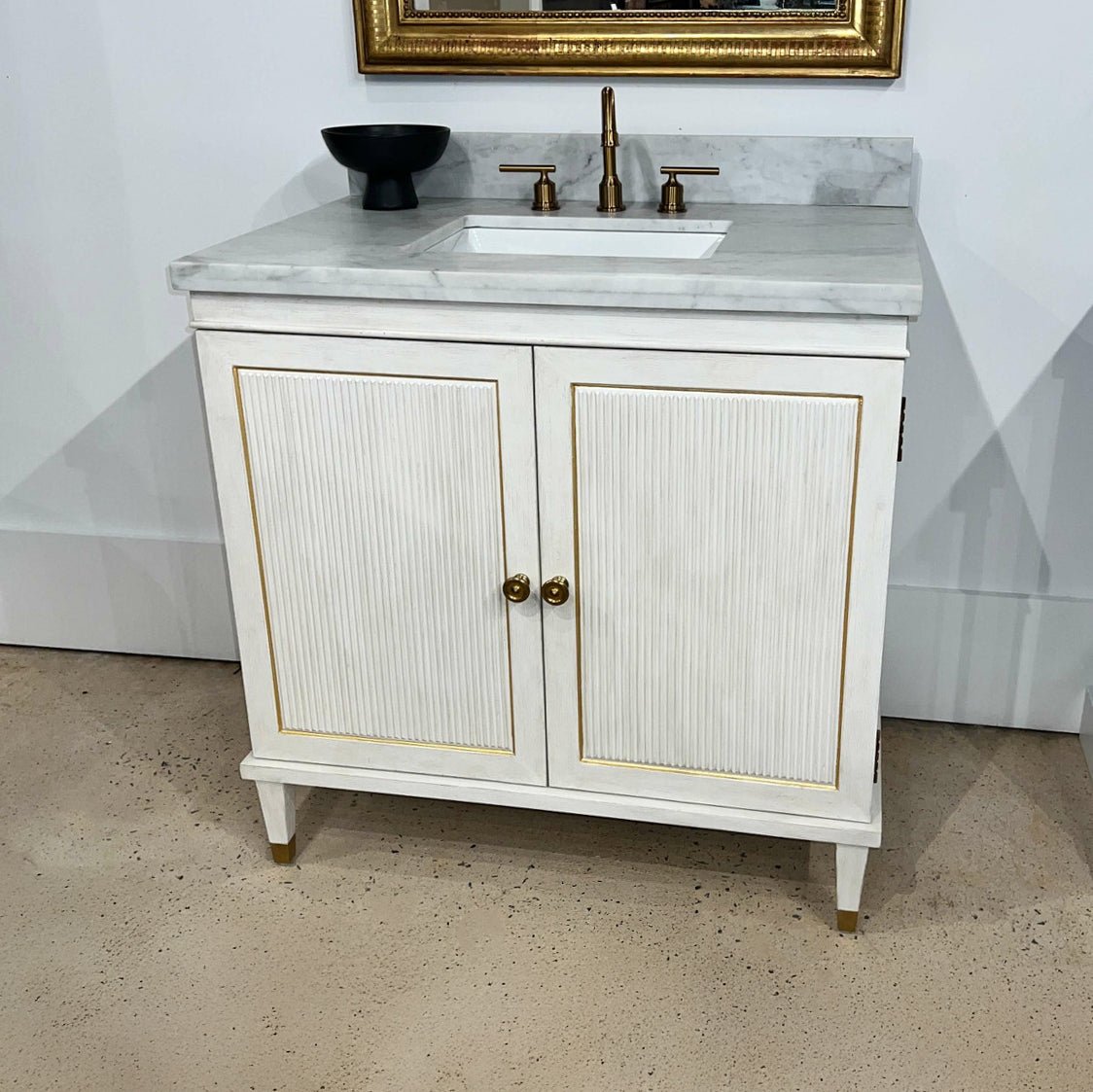 Installed Swedish Neoclassic vanity with top view angle.