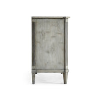 Side view of Swedish commode, antiqued grey finish.