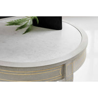 Close-up of round side table with marble top.
