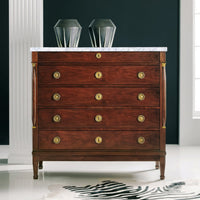 Tall Empire chest, marble top, with decor items.